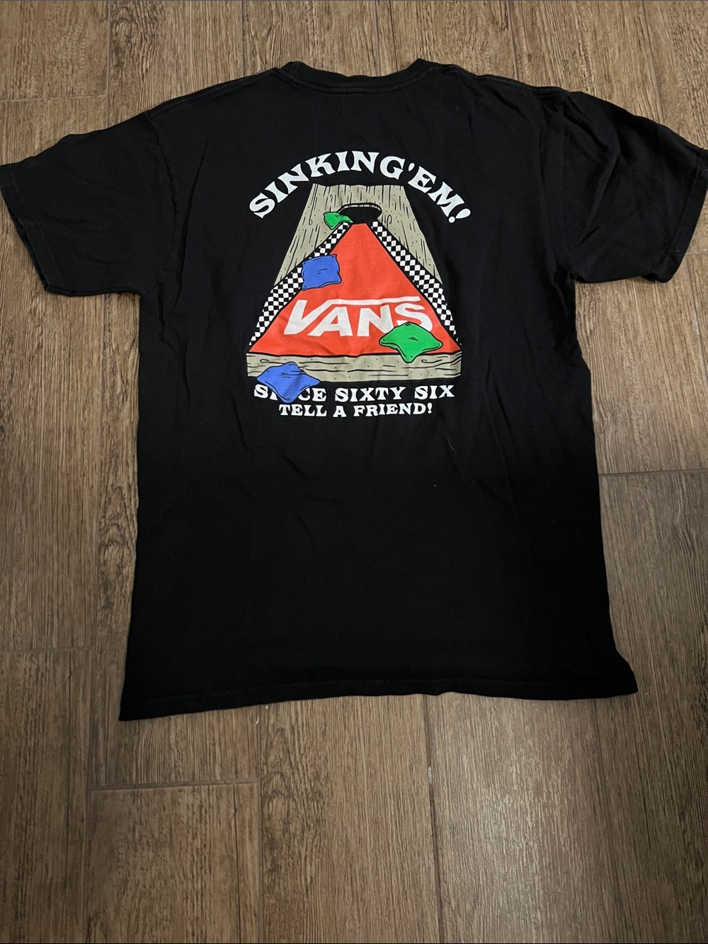 Vans Black Tee with Red Pyramid Graphic and Multicolor Accents